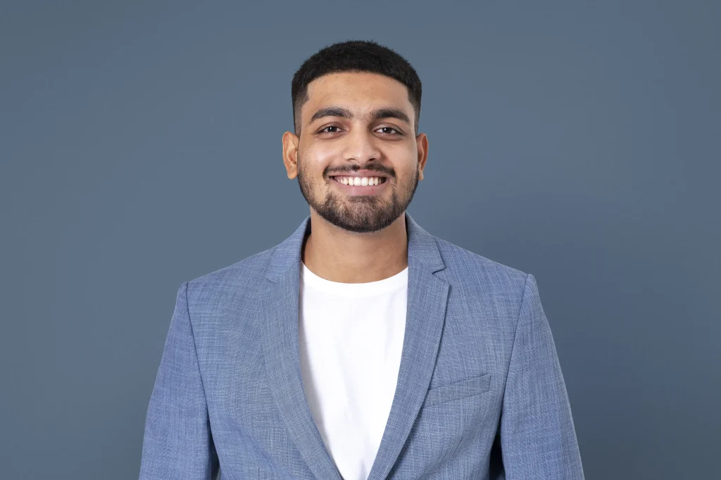 Cheerful indian businessman smiling closeup portrait jobs career campaign result 1024x682